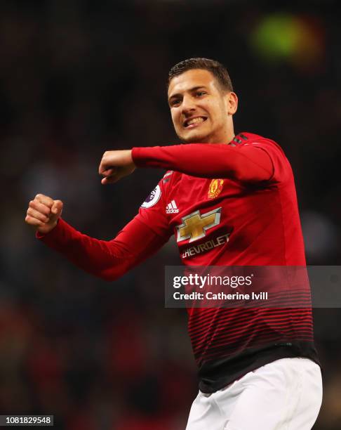 Diogo Dalot of Manchester United celebrates victory after the Premier League match between Tottenham Hotspur and Manchester United at Wembley Stadium...