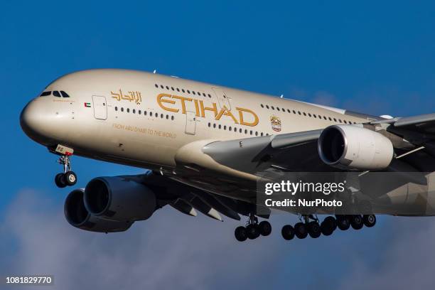 Etihad Airways Airbus A380 with registration A6-APG landing in London Heathrow International Airport in England during a nice day. Etihad or EY is...