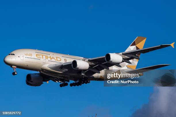 Etihad Airways Airbus A380 with registration A6-APG landing in London Heathrow International Airport in England during a nice day. Etihad or EY is...