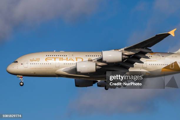 Etihad Airways Airbus A380 with registration A6-APG landing in London Heathrow International Airport in England during a nice day. Etihad or EY is...