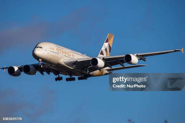 Etihad Airways Airbus A380 with registration A6-APG landing in London Heathrow International Airport in England during a nice day. Etihad or EY is...