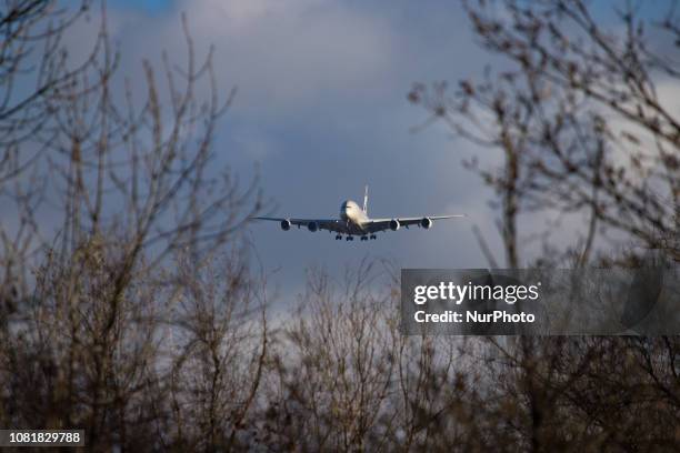 Etihad Airways Airbus A380 with registration A6-APG landing in London Heathrow International Airport in England during a nice day. Etihad or EY is...