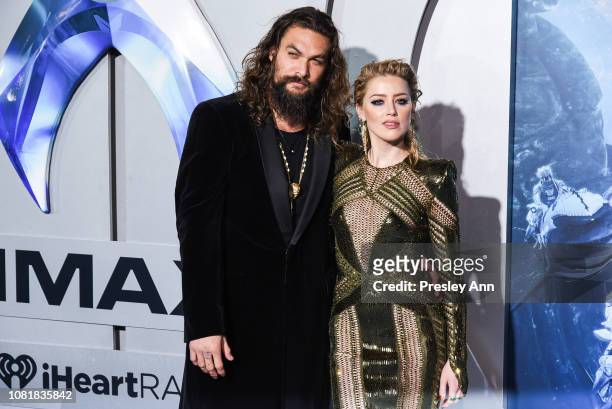 Jason Momoa and Amber Heard attends the premiere of Warner Bros. Pictures' "Aquaman" at TCL Chinese Theatre on December 12, 2018 in Hollywood,...