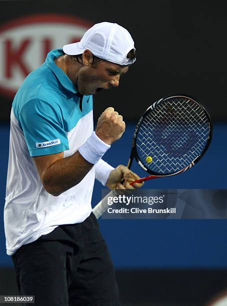 Illya Marchenko of the Ukraine reacts in his second round match against Andy Murray of Great Britain during day four of the 2011 Australian Open at...