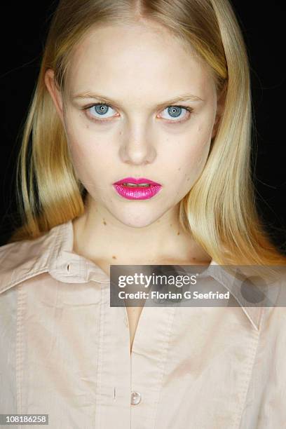 Model poses backstage prior the Schumacher Show during the Mercedes Benz Fashion Week Autumn/Winter 2011 at Bebelplatz on January 20, 2011 in Berlin,...