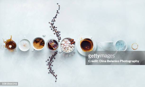 solar system made out of a variety of coffee cups. creative food concept with coffee splashes. planets and outer space still life. - moka pot stockfoto's en -beelden