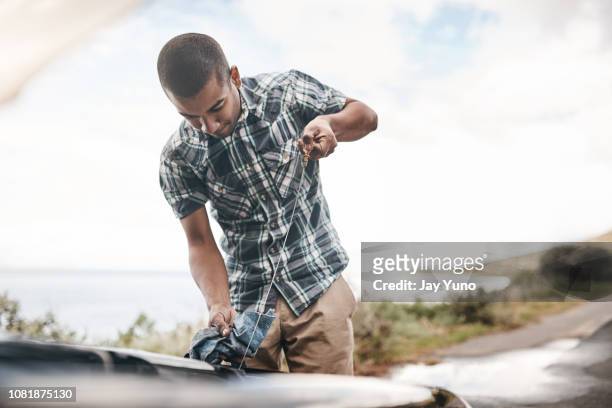 let me check the oil - dipstick stock pictures, royalty-free photos & images