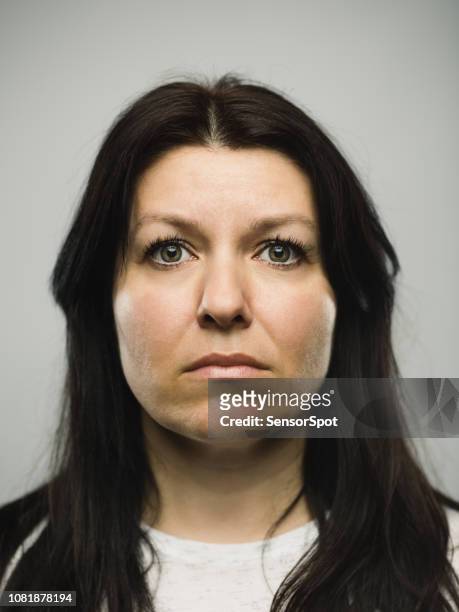 real caucasian adult woman with blank expression - mug shot stock pictures, royalty-free photos & images