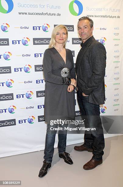 Actor Hannes Jaenicke and Michaela Merten pose for the media during the Success for Future Award 2011 press conference on January 20, 2011 in Munich,...