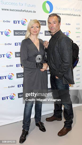 Actor Hannes Jaenicke and Michaela Merten pose for the media during the Success for Future Award 2011 press conference on January 20, 2011 in Munich,...