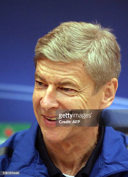 Arsenal FC coach Arsene Wenger smiles during his press conference in Donetsk on November 2 a day before UEFA Champions League, Group H football match...