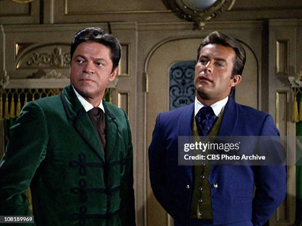 Ross Martin as Artemus Gordon and Robert Conrad as James T. West in "The Night of the Eccentrics," season 2, episode 1 of THE WILD WILD WEST....