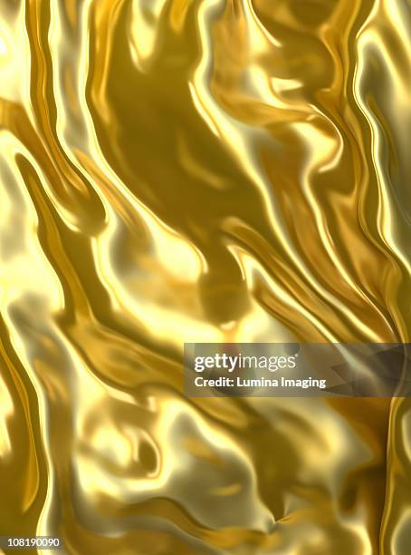 golden waves - shiny fabric stock pictures, royalty-free photos & images