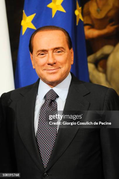 Italian Prime Minister Silvio Berlusconi poses for a photo with Somalian Prime Minister Mohammed Abdullahi Mohammed , during a meeting at Palazzo...