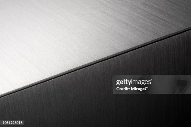 brushed metal surface splice - high contrast texture stock pictures, royalty-free photos & images