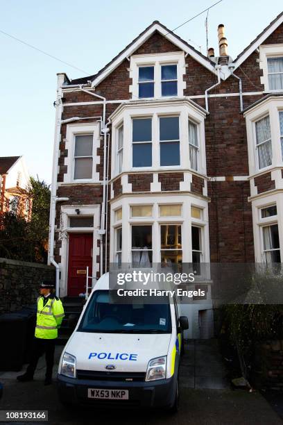 Police stand guard as investigators search a property on Aberdeen Road where a 32-year-old man was arrested this morning in connection with the...