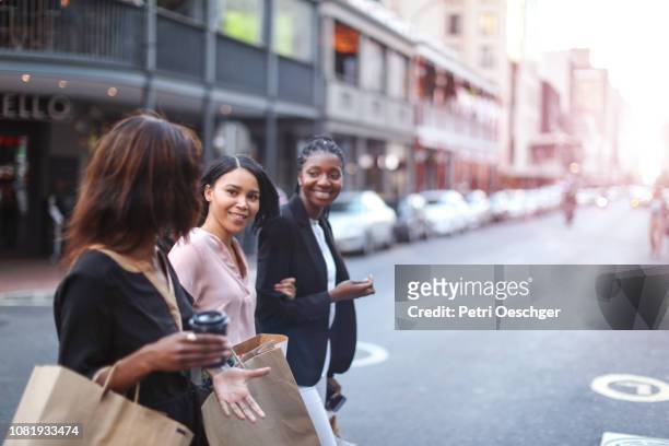girls gone shopping. - african woman shopping stock-fotos und bilder