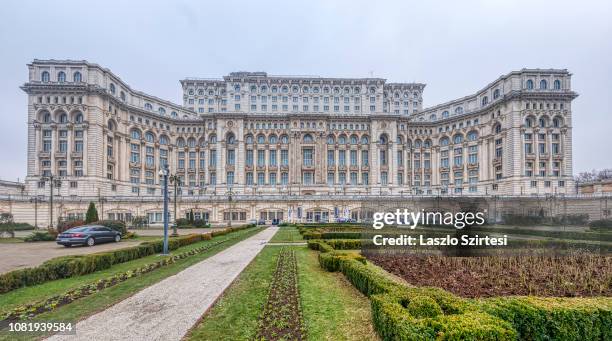 The Palatul Parlamentului is seen from its garden on December 9, 2018 in Bucharest, Romania. The Palace of the Parliament is the second largest...