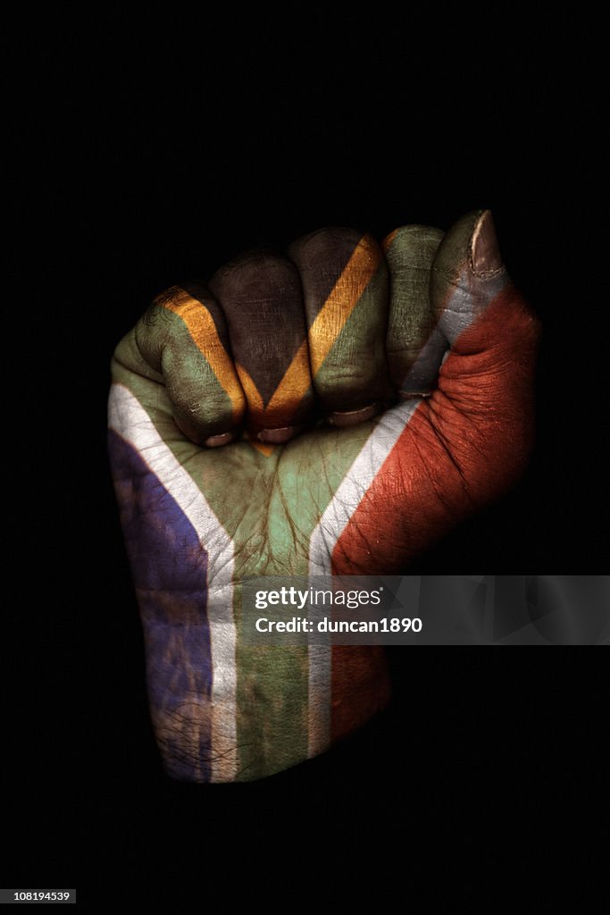 Clenched Fist with South African Flag Painted, Isolated on Black