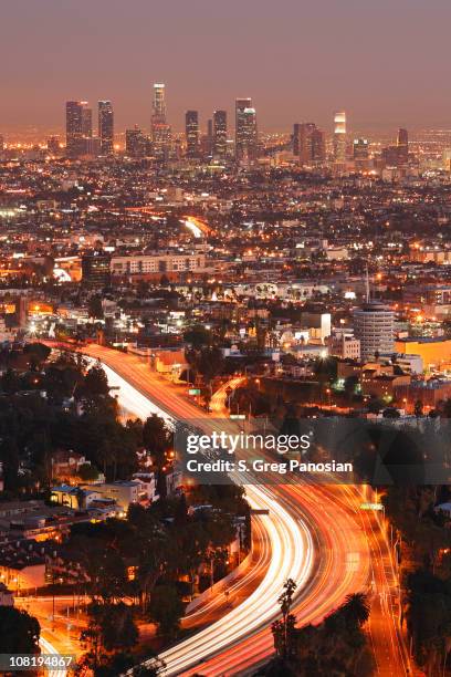 los angeles skyline at dusk, motion blur of cars - hollywood at night stock pictures, royalty-free photos & images