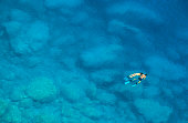 Man and Woman Snorkelling in Blue Mediterranean Sea