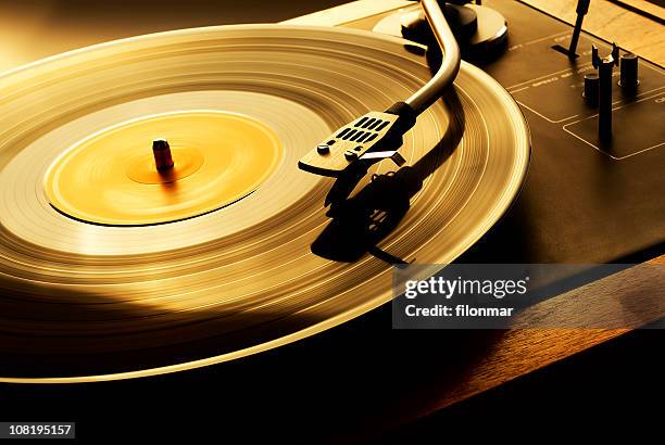 record spinning on turn table - retro turntable stock pictures, royalty-free photos & images