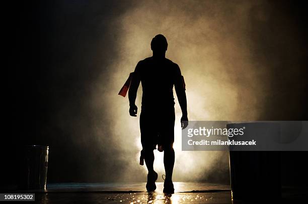 silhouette of man backlit - opening night of the graduate los angeles stockfoto's en -beelden