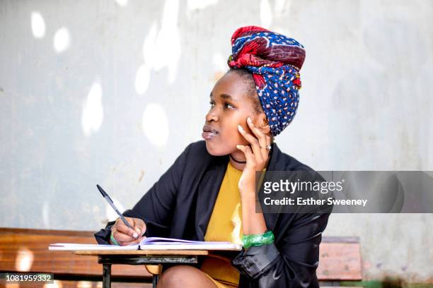 young woman in deep thought - showus africa stock pictures, royalty-free photos & images