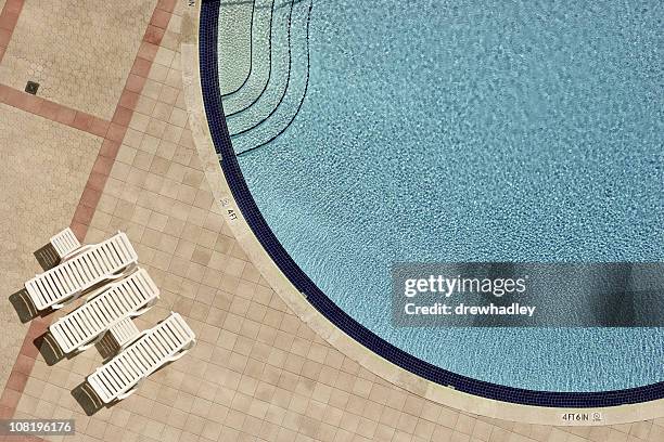 swimming pool and lounge chairs - miami architecture stock pictures, royalty-free photos & images
