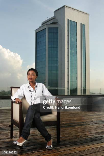 top floor creative - woman elegant crossed legs stock pictures, royalty-free photos & images