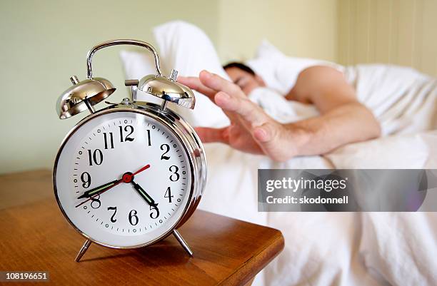 Clocking Off Turning Off Alarm Clock High-Res Stock Photo - Getty Images
