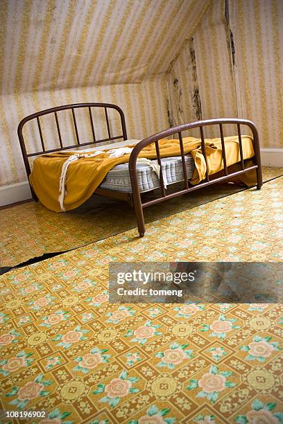old bed with sheets in abandoned house - damaged carpet stock pictures, royalty-free photos & images