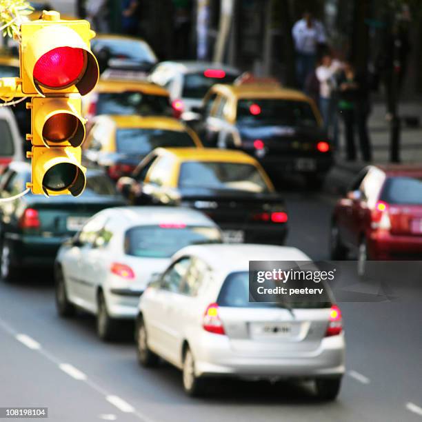 traffic jam on city street - car red light stock pictures, royalty-free photos & images