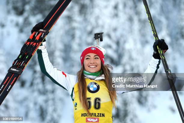Dorothea Wierer of Italy celebrates her gold medal on the podium during the 7.5 km Women's Sprint at the IBU Biathlon World Cup on December 13, 2018...