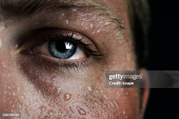 low-key eye - sweating stock pictures, royalty-free photos & images