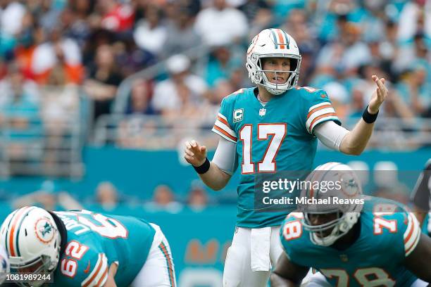 Ryan Tannehill of the Miami Dolphins reacts against the New England Patriots at Hard Rock Stadium on December 9, 2018 in Miami, Florida.