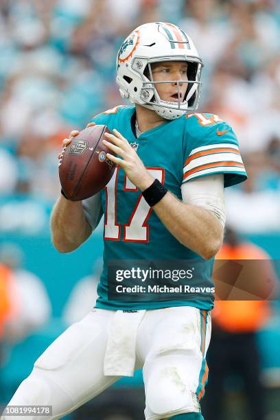 Ryan Tannehill of the Miami Dolphins in action against the New England Patriots at Hard Rock Stadium on December 9, 2018 in Miami, Florida.