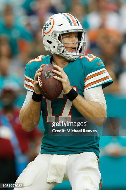 Ryan Tannehill of the Miami Dolphins in action against the New England Patriots at Hard Rock Stadium on December 9, 2018 in Miami, Florida.