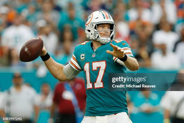 Ryan Tannehill of the Miami Dolphins in action against the New England Patriots at Hard Rock Stadium on December 9, 2018 in Miami, Florida.