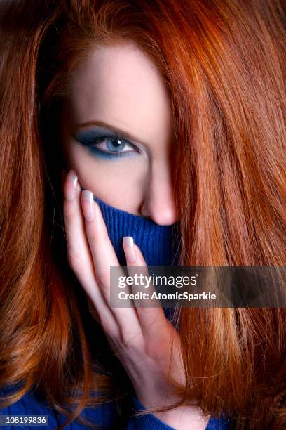young red haired woman wearing blue turtle neck sweater - blå ögonskugga bildbanksfoton och bilder