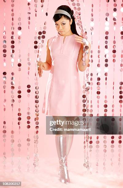 asian woman dressed in retro clothing - woman pink dress stock pictures, royalty-free photos & images