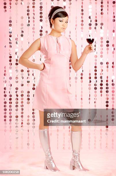 young woman dressed in retro clothing - 60s fashion woman stock pictures, royalty-free photos & images