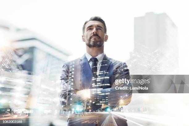 de stad is zijn speeltuin - double exposure business stockfoto's en -beelden