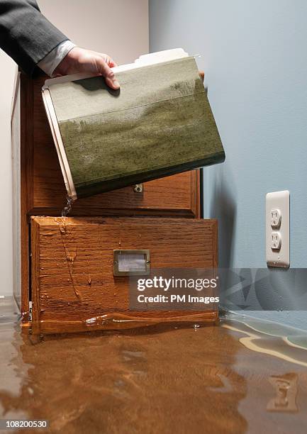 Exploding Filing Cabinet 38 File Cabinet Accident Stock Photos, High-Res Pictures, and Images ...