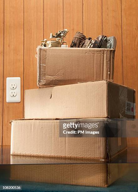 storage boxes in flooded basement - basement flood stock pictures, royalty-free photos & images