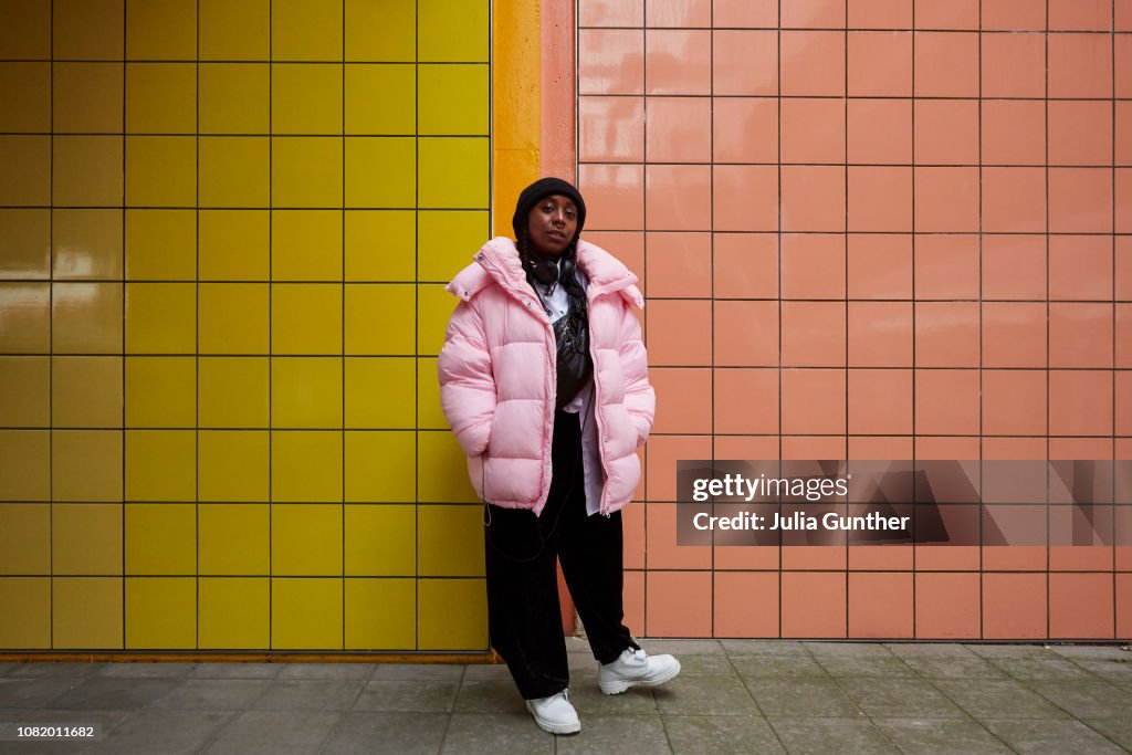 Woman stands at subway station