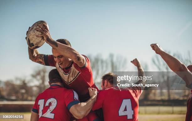 rugby players in action during the game. - scrum roles stock pictures, royalty-free photos & images