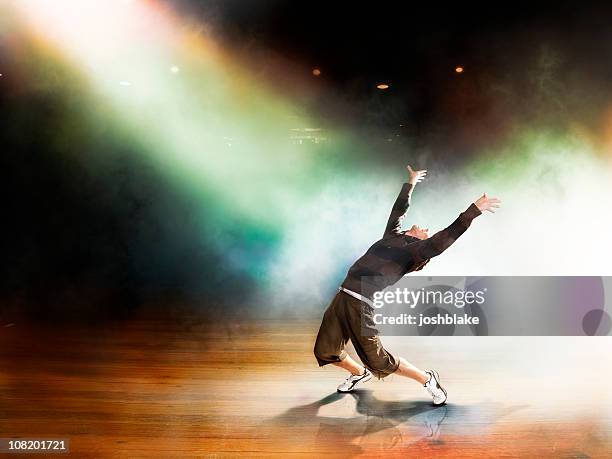 dancing through light - theatre performer stockfoto's en -beelden