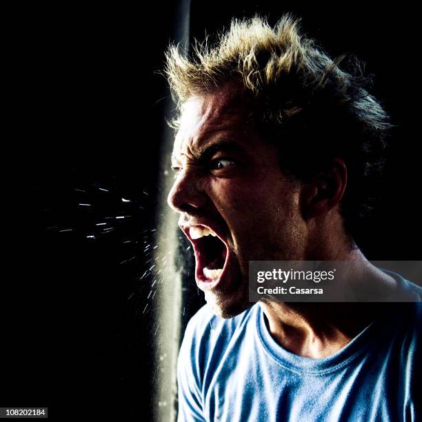 angry young man yelling and spitting - spats stock pictures, royalty-free photos & images