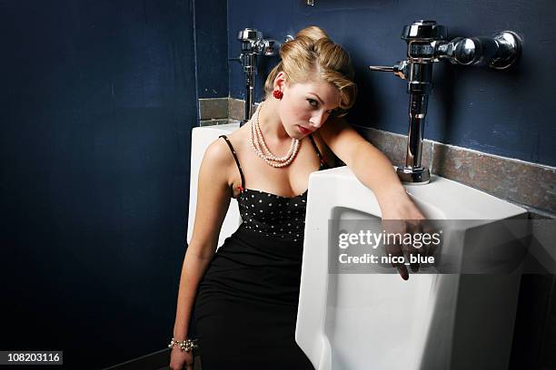 Using Urinal 114 Women Using Urinal Stock Photos, High-Res Pictures, and Images ...
